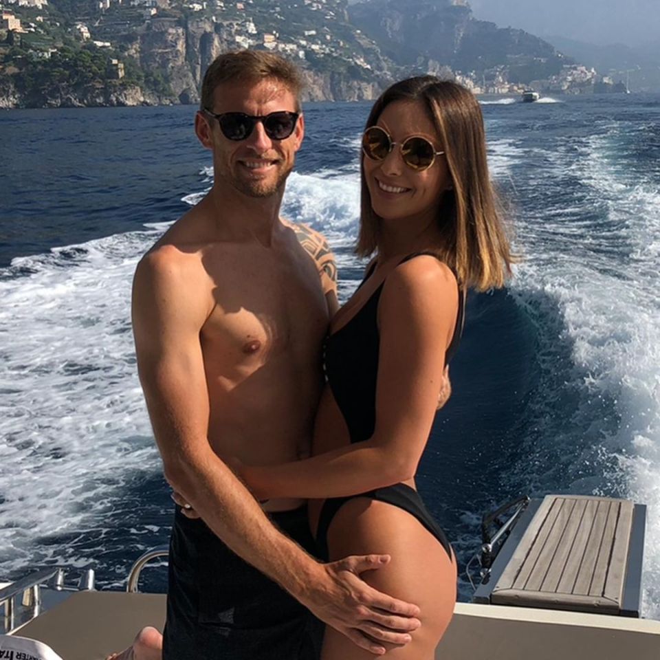 Jenson Button and Brittny Ward embracing on a boat.