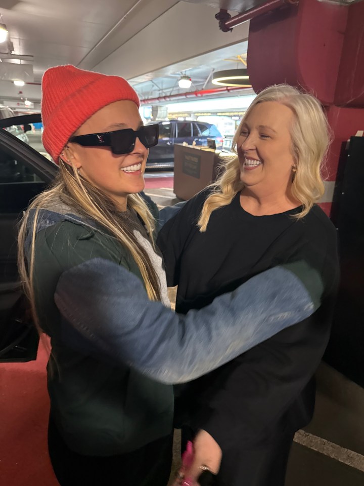 JoJo Siwa hugging her mother at LAX.