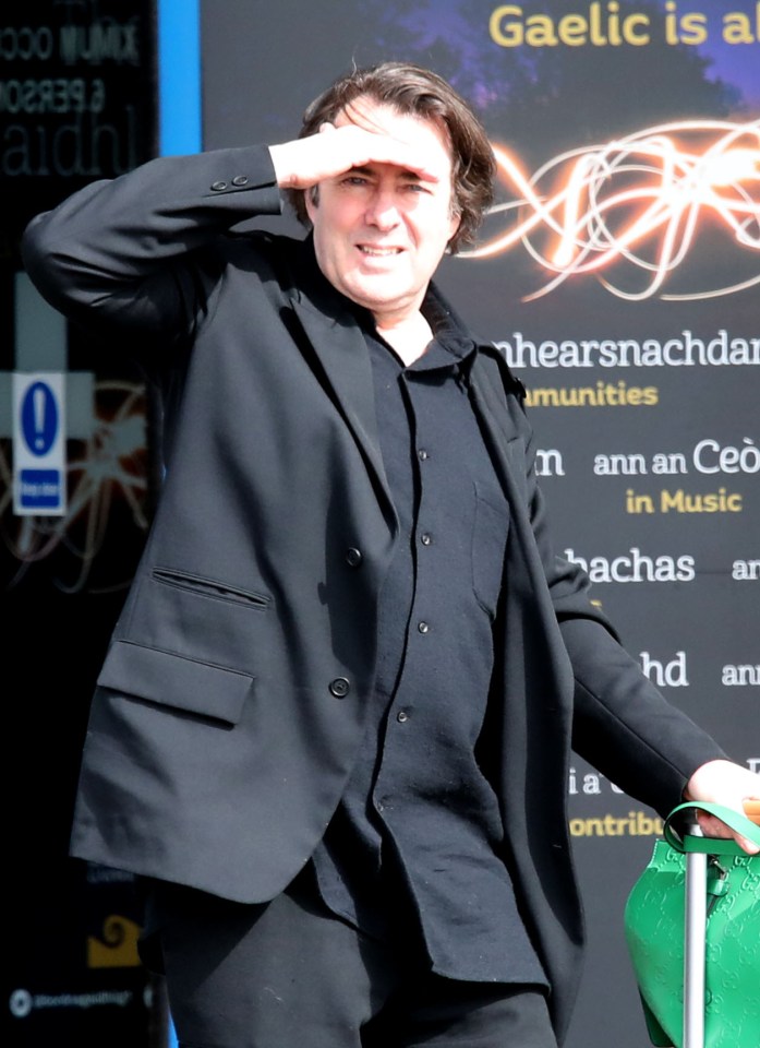 Jonathan Ross arriving at Inverness airport.