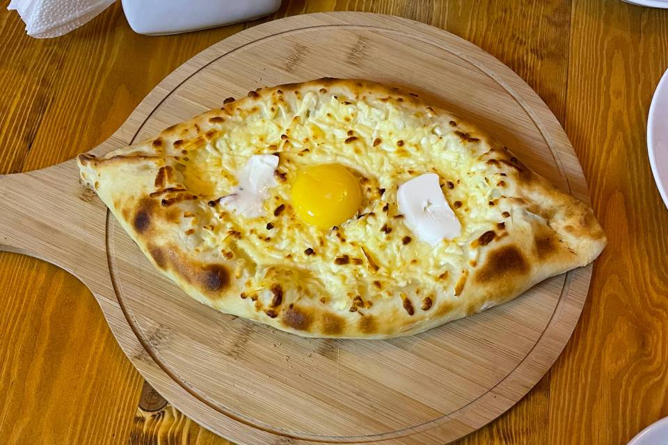 Khachapuri, a Georgian cheese bread with egg yolk.