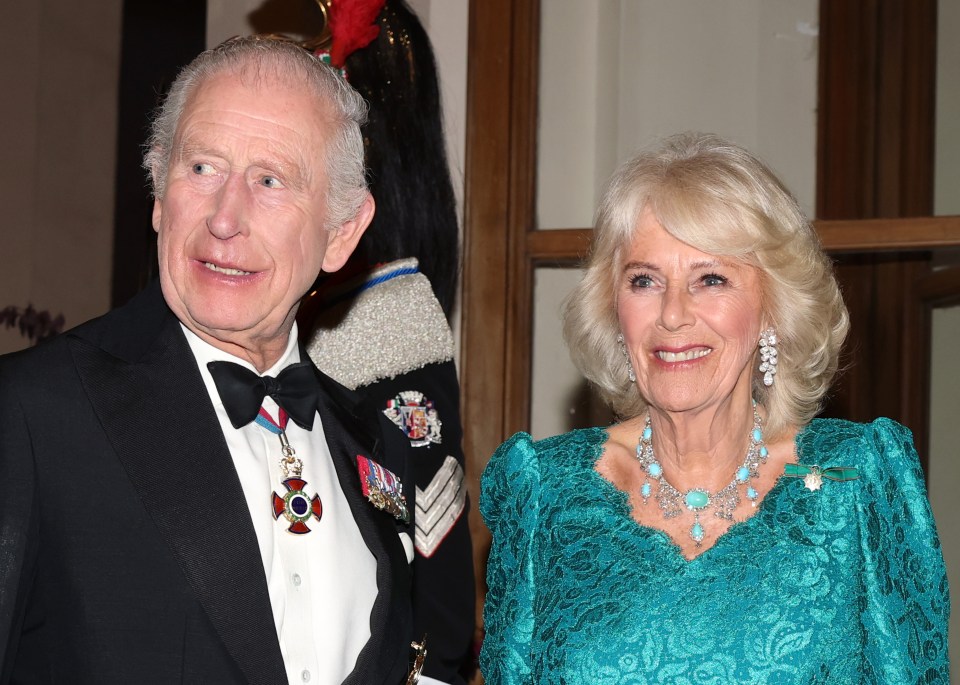 King Charles III and Queen Camilla at a state banquet.
