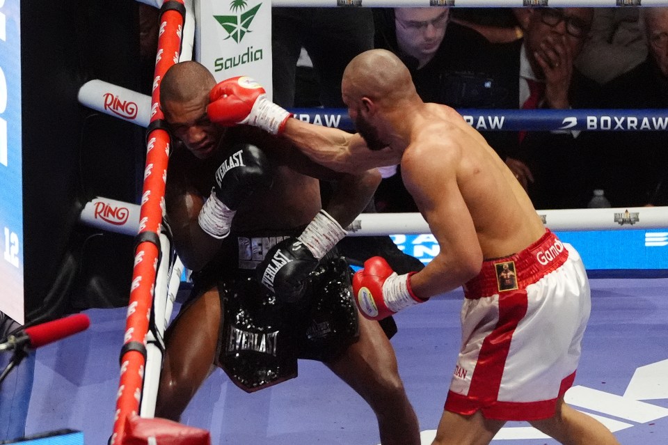 Chris Eubank Jr. lands a punch on Conor Benn during a boxing match.