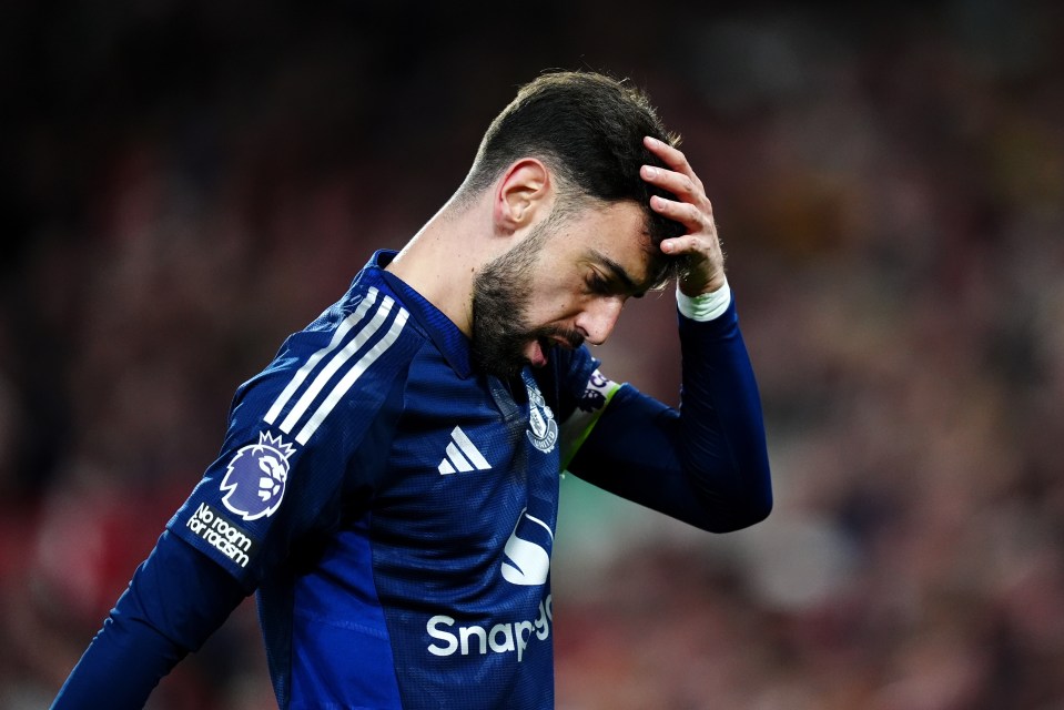 Bruno Fernandes of Manchester United looking distressed during a Premier League match.