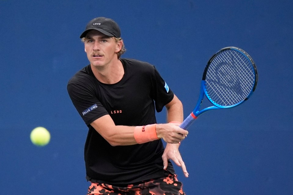 Max Purcell returning a tennis shot.
