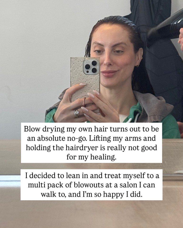 Woman blow-drying her hair at a salon.