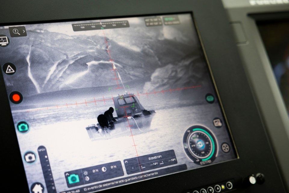 Thermal image of a small boat on a screen.