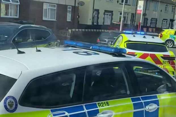 An image collage containing 1 images, Image 1 shows Screenshot of a police car parked on a residential street