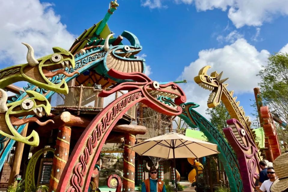 An image collage containing 1 images, Image 1 shows Dragon-shaped playground structures at Universal's Epic Universe