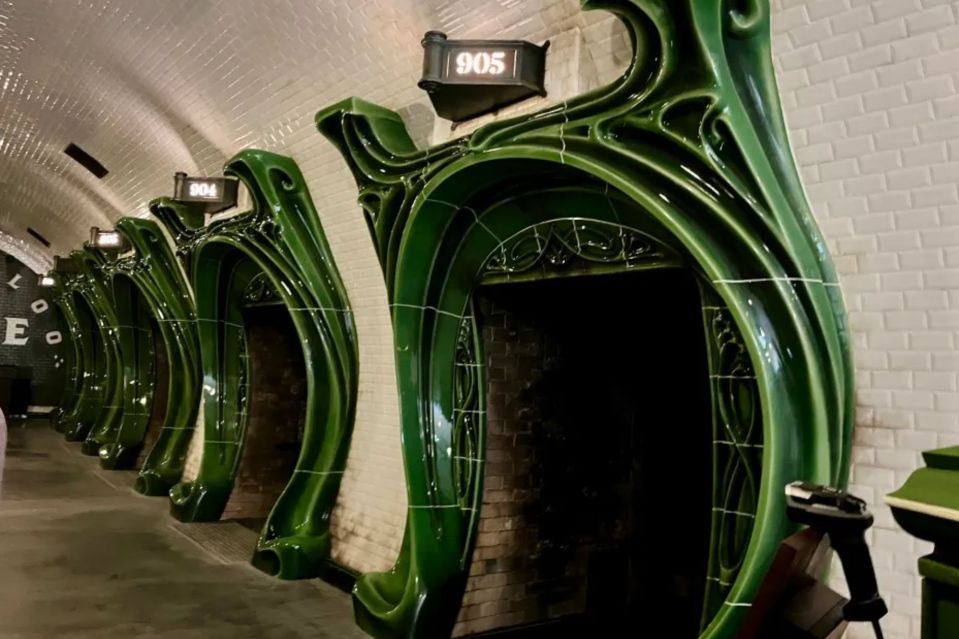 An image collage containing 1 images, Image 1 shows Green tiled archways in a subway station