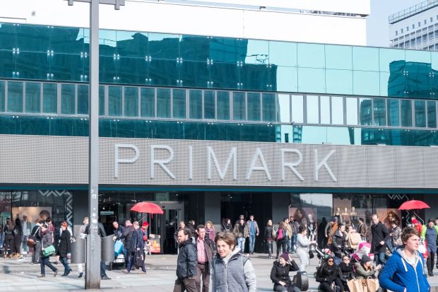 An image collage containing 1 images, Image 1 shows people walking in front of a store called primark