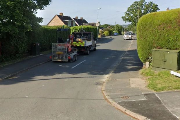 An image collage containing 1 images, Image 1 shows Street scene with a small digger on a trailer being towed by a van