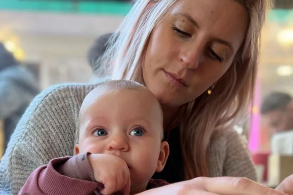 An image collage containing 1 images, Image 1 shows Woman holding baby