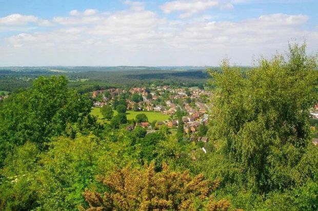 An image collage containing 1 images, Image 1 shows Aerial view of Kinver Edge, Staffordshire, resembling the Grand Canyon
