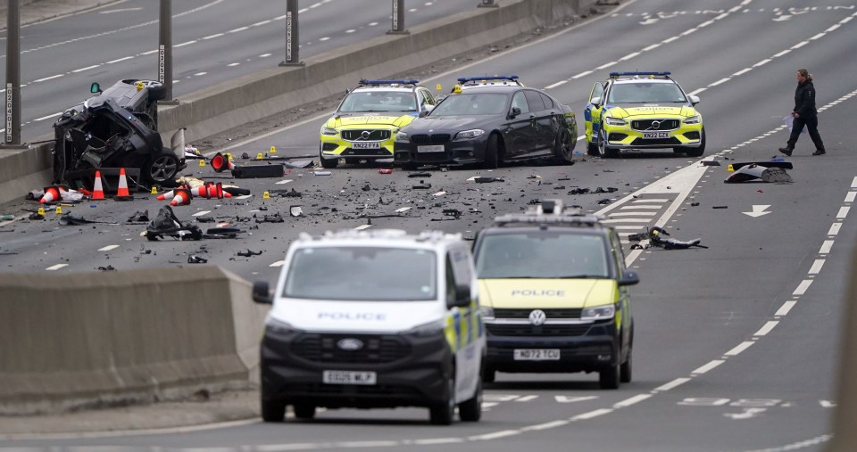 Aftermath of a multi-vehicle collision on a highway.