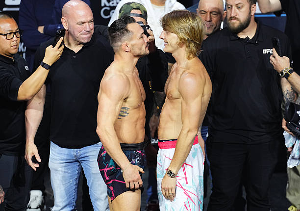 MIAMI, FLORIDA - APRIL 11: (L-R) Opponents Michael Chandler and Paddy Pimblett of England face off during the UFC 314 ceremonial weigh-in at Kaseya Center on April 11, 2025 in Miami, Florida.  (Photo by Jeff Bottari/Zuffa LLC)