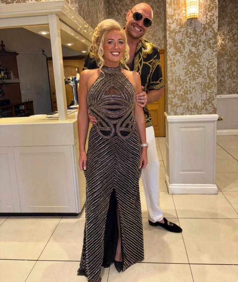 Paris and Tyson Fury at a glamorous event.