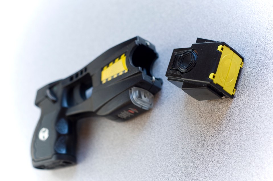 Police taser with cartridge removed.