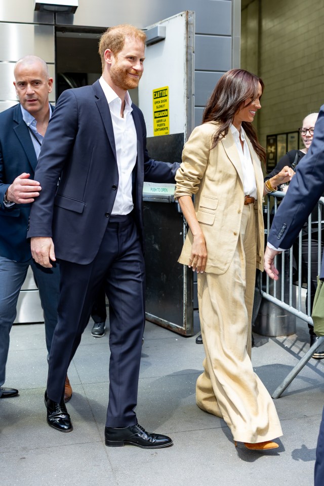 Prince Harry and Meghan Markle walking in New York City.