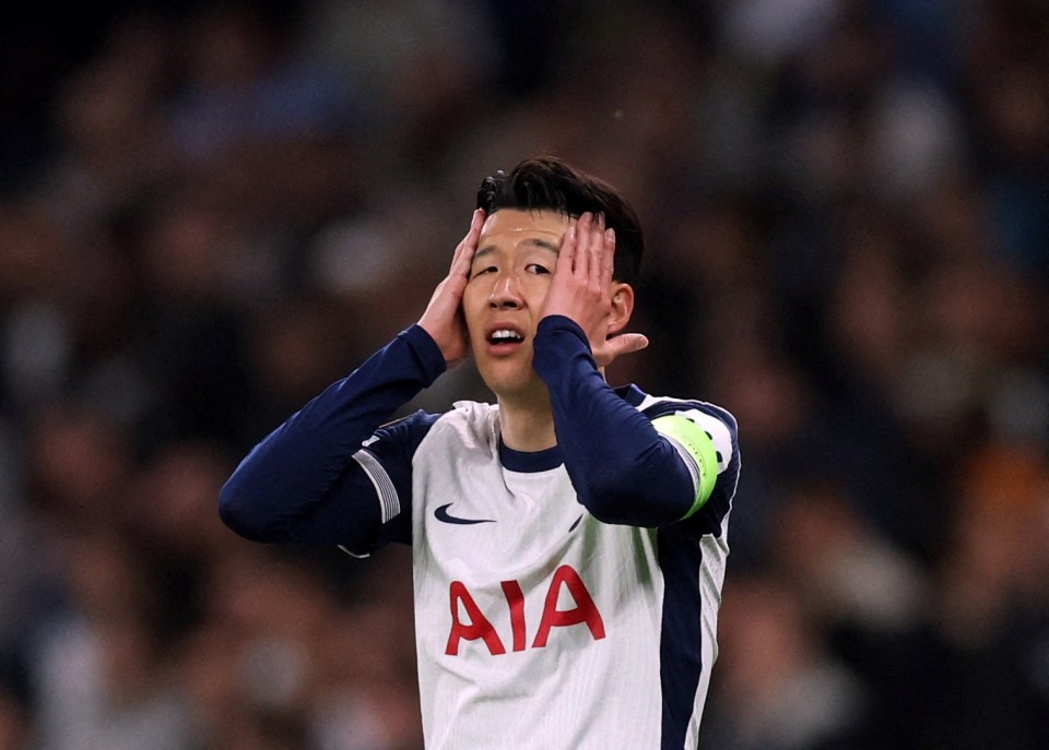 Son Heung-min of Tottenham Hotspur looking distraught.
