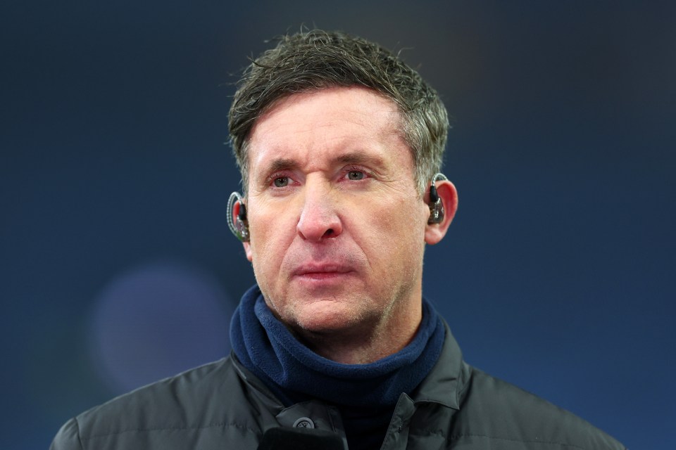 Headshot of Robbie Fowler at a Premier League match.
