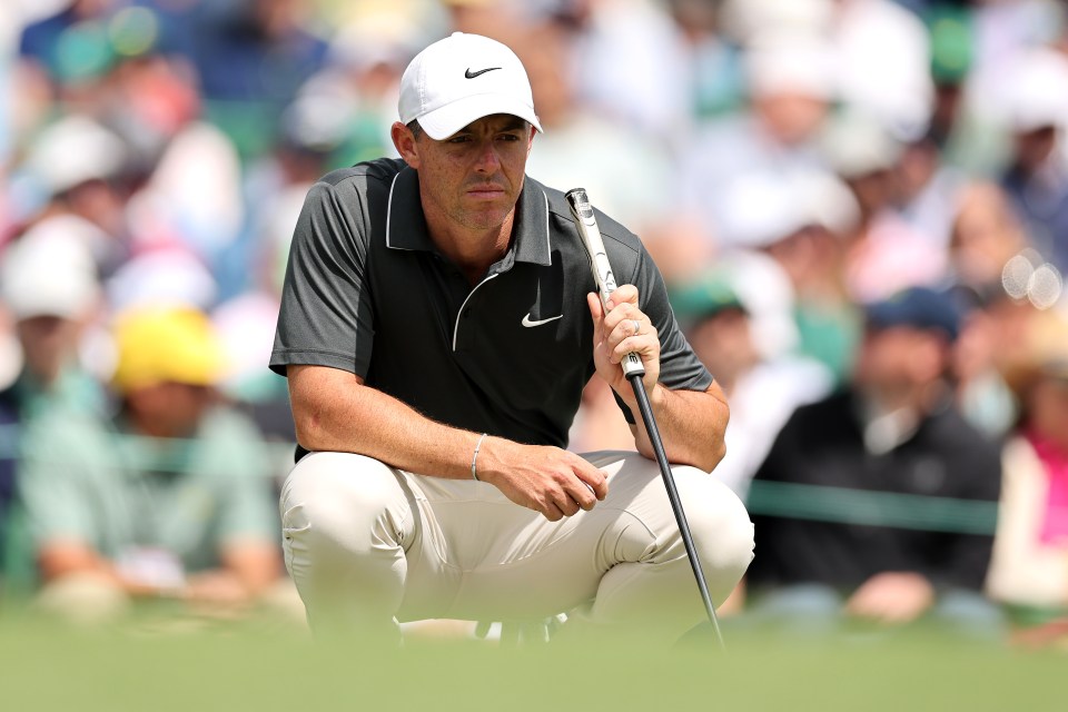 Rory McIlroy lining up a putt.