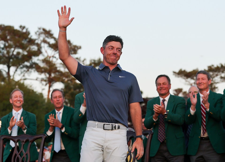 Rory McIlroy waves to the crowd after winning the Masters Tournament.
