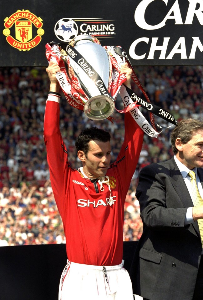 Ryan Giggs lifting the Premiership trophy.