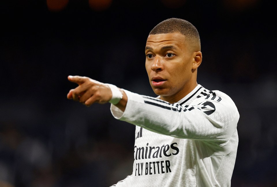 Kylian Mbappé of Real Madrid reacting during a soccer match.