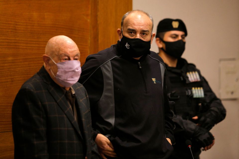 Golfer Angel Cabrera and his lawyer Carlos Hairabedian at a court hearing.