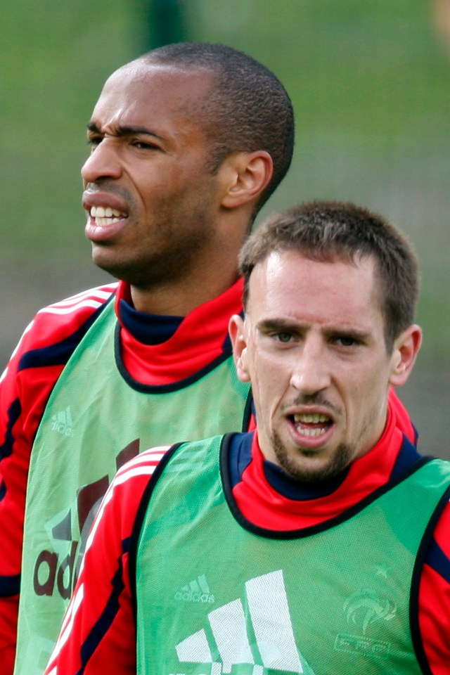 Thierry Henry and Franck Ribery at a soccer training session.
