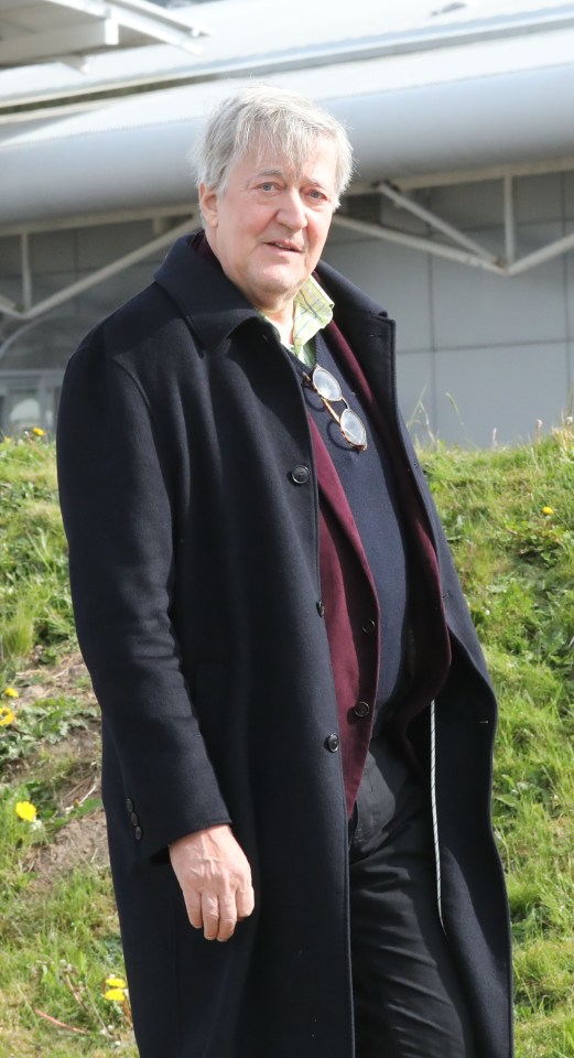 Stephen Fry arriving at Inverness airport.