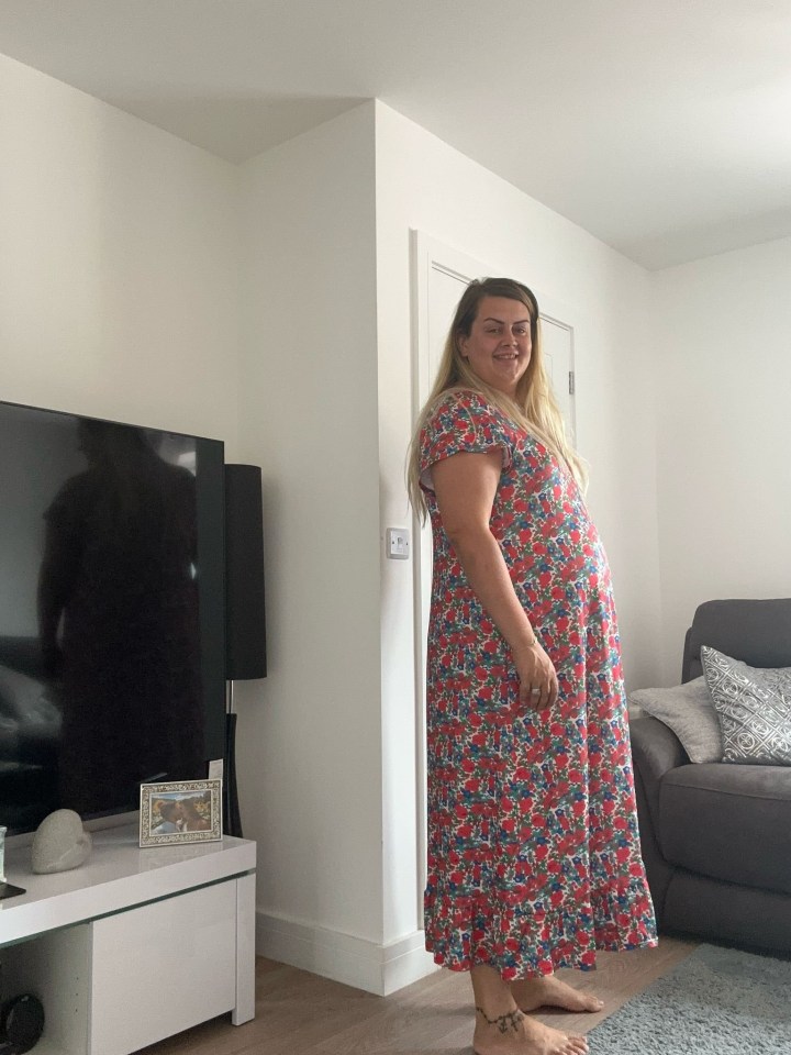Woman in floral dress.