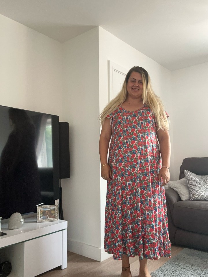 Woman in floral dress.