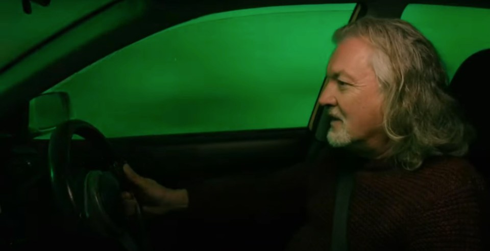 James May driving a car in a tunnel.