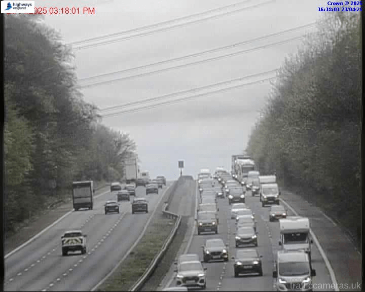 Live traffic on the M6 motorway between junctions 34 and 35.