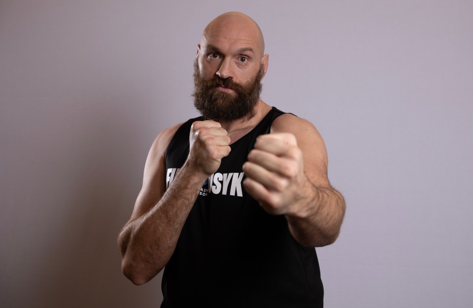 Portrait of Tyson Fury in a boxing stance.