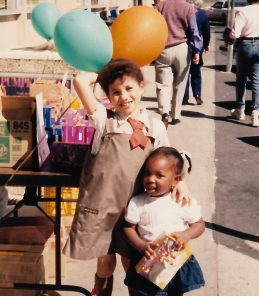 Young Meghan Markle selling cookies with a friend.
