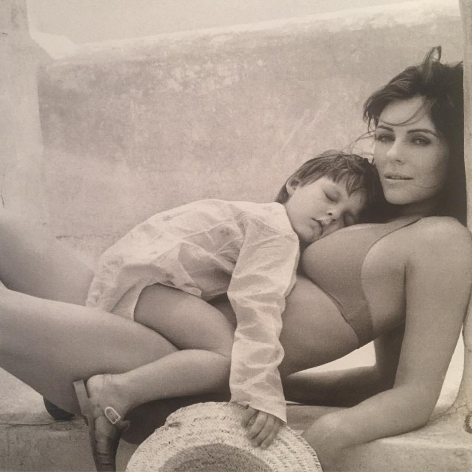 Black and white photo of a woman and a child.