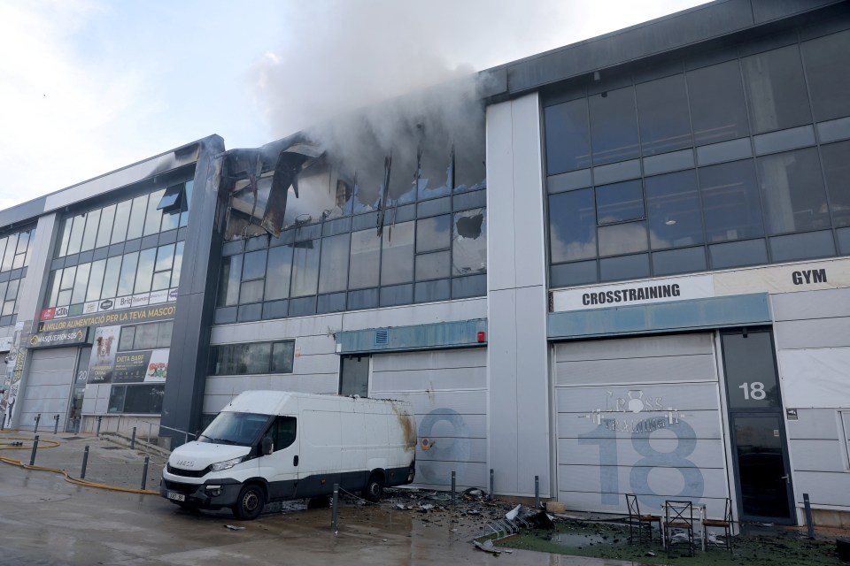 Smoke billows from a fire-damaged building in Vilanova i la Geltru.
