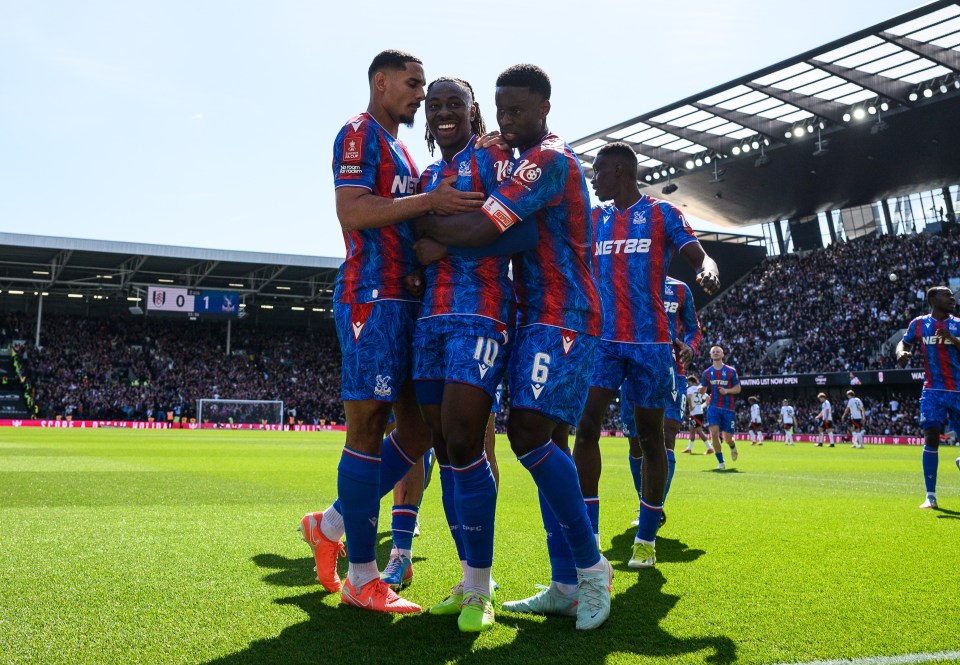 Crystal Palace soccer players celebrating a goal.
