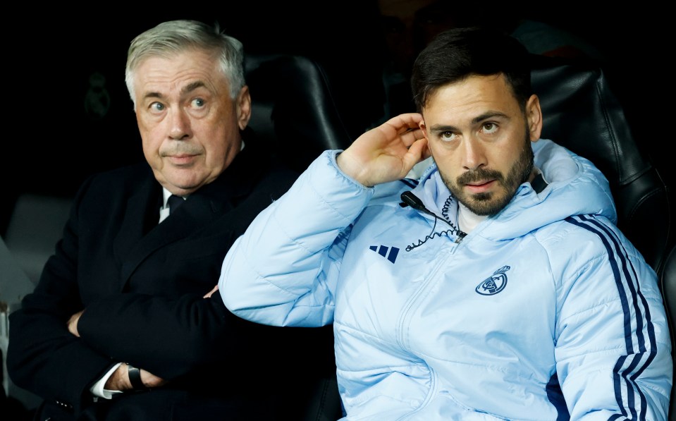 Carlo Ancelotti and Davide Ancelotti at a Real Madrid soccer match.