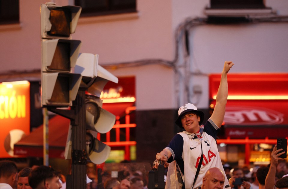 A Tottenham Hotspur fan celebrates in Bilbao.