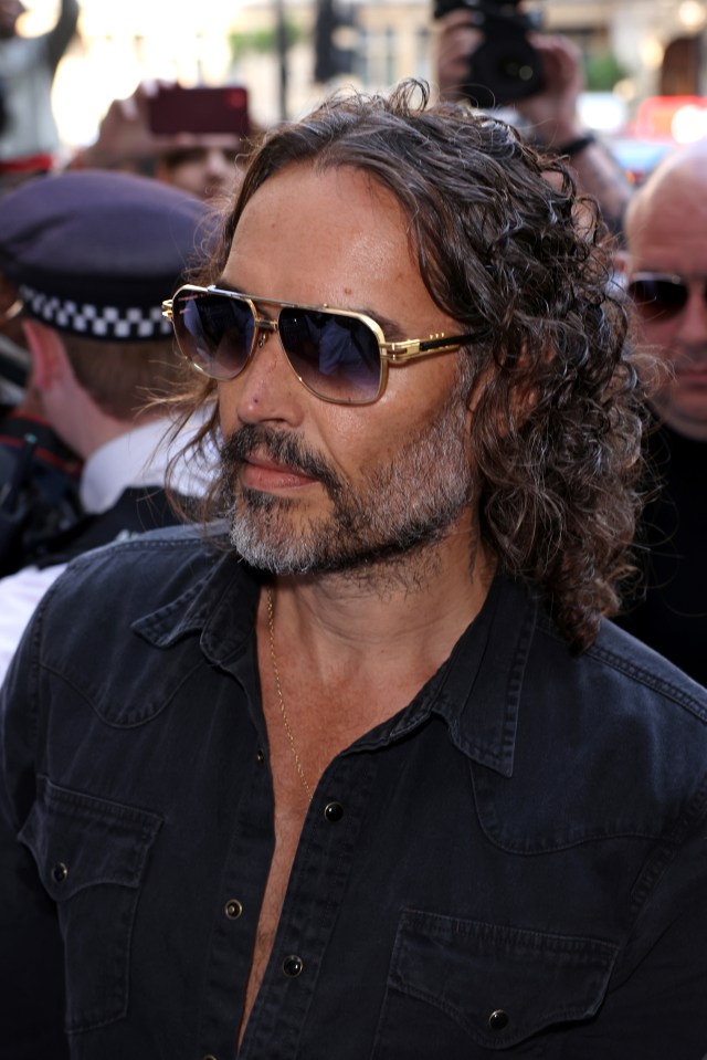 Russell Brand arriving at court, facing sexual offence charges.