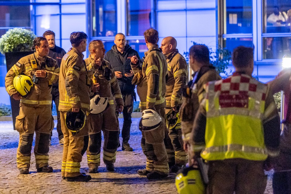 Firefighters at the scene of a fire.