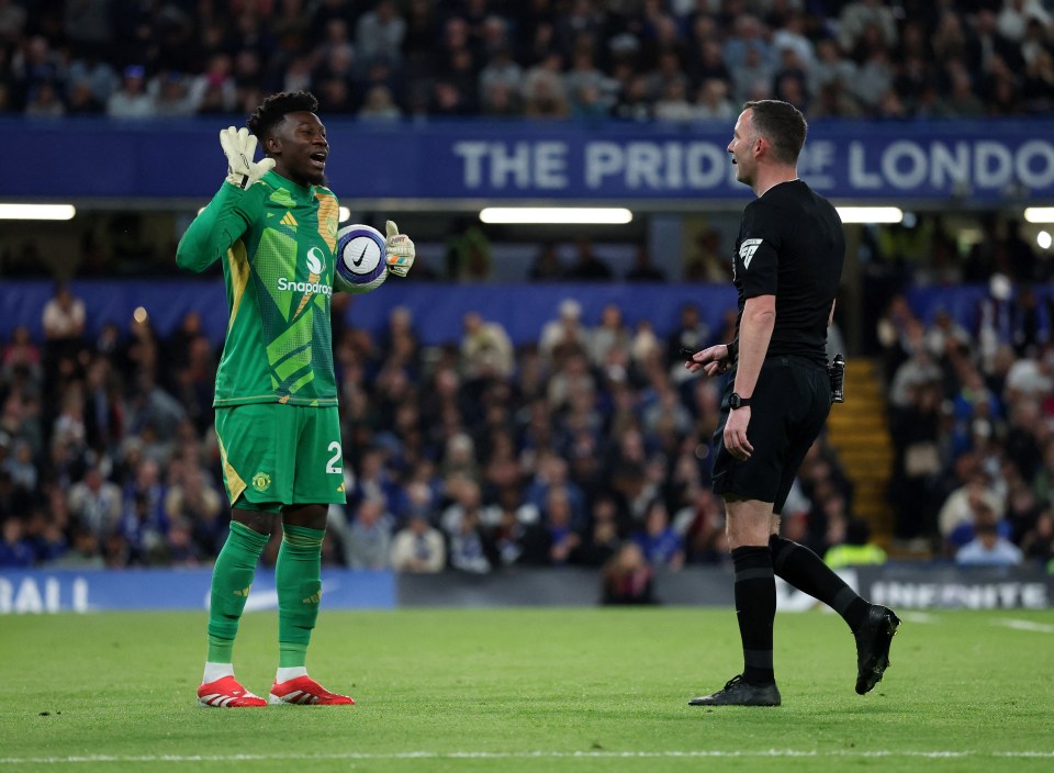 Manchester United's Andre Onana reacts to a referee's decision during a soccer match.
