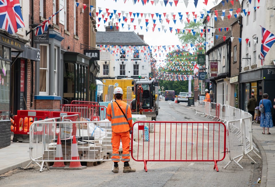 Roadworks blocking a street in Ashbourne, Derbyshire.