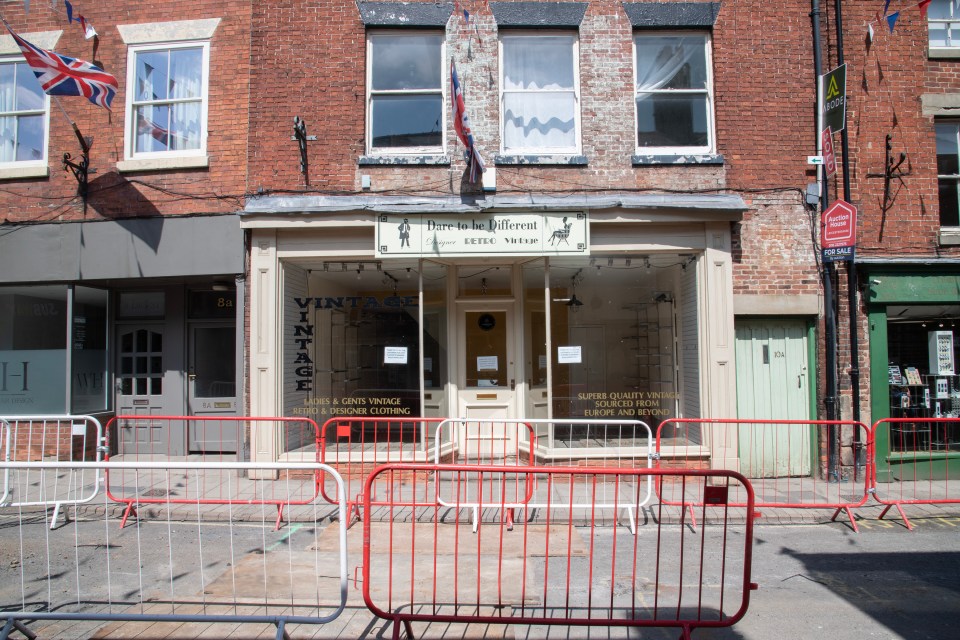 Roadworks outside a closed vintage clothing shop in Ashbourne.