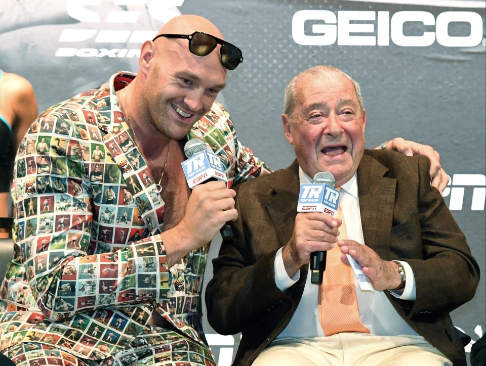 Tyson Fury and Bob Arum at a news conference.