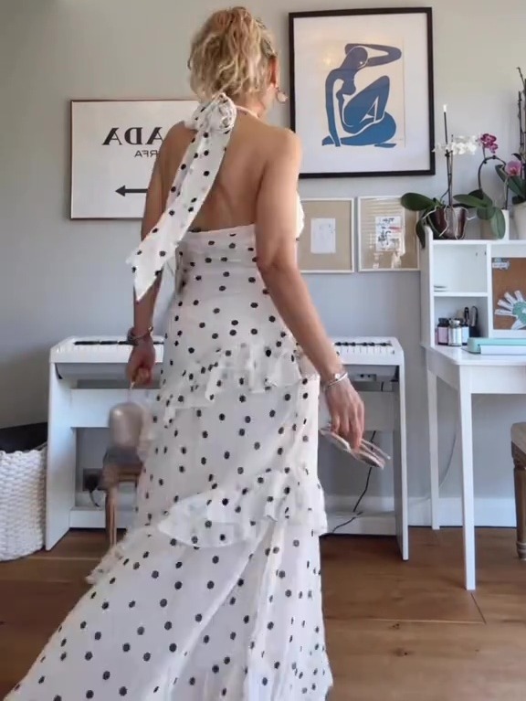 Woman in polka dot dress.