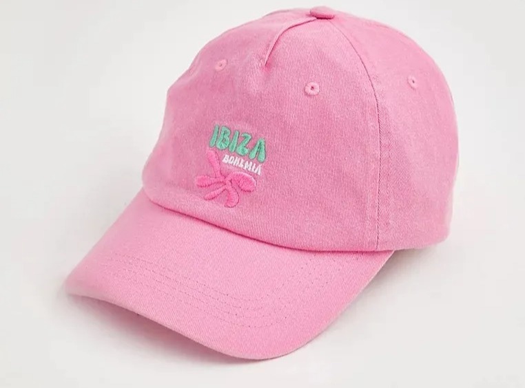 Pink baseball cap with "Ibiza Bohemia" embroidered on the front.